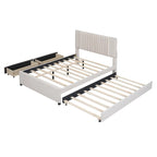 Lit plateforme tapissé de lin, tête de lit à lignes verticales avec garniture cloutée, cadre de lit en panneaux de bois avec tiroirs et lit gigogne