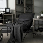 Fauteuil d'appoint Leonidas en similicuir noir avec cadre en métal noir