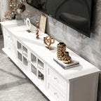 Meuble TV moderne blanc avec portes vitrées et tiroirs, console de divertissement